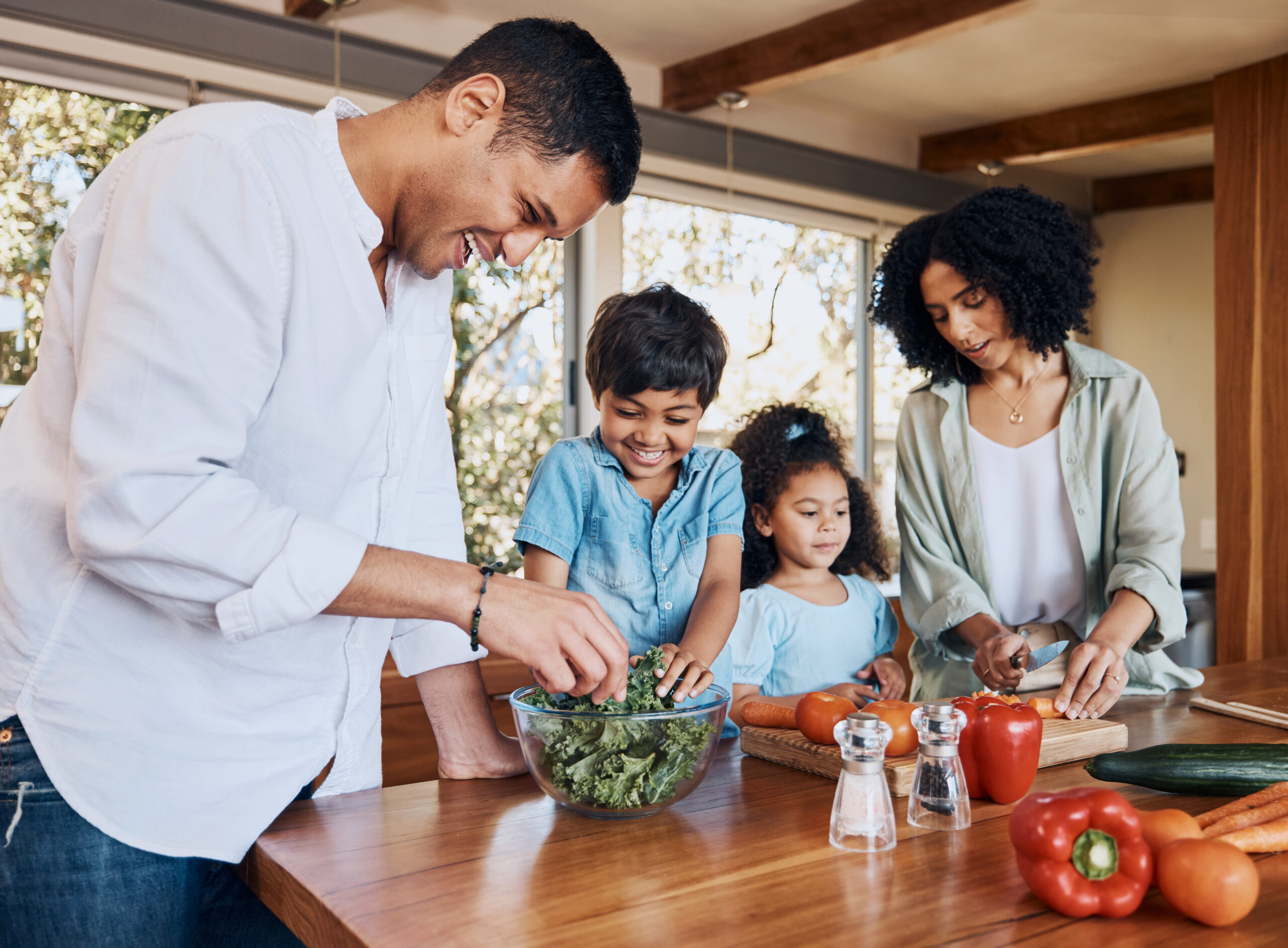 Cooking, health and help with family in kitchen for learning, food and nutrition. Wellness, teaching and vegetable with parents and children at home for meal prep, support and dinner together GI Exam